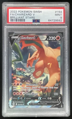 a16f6c5b-5181-46cf-a0d9-a2805baed683_cc8b7fee-0a60-40db-9ff4-d3279452f562 PreviousNext 2022 Pokemon Sword & Shield Brilliant Stars #154/172 Charizard V PSA 9